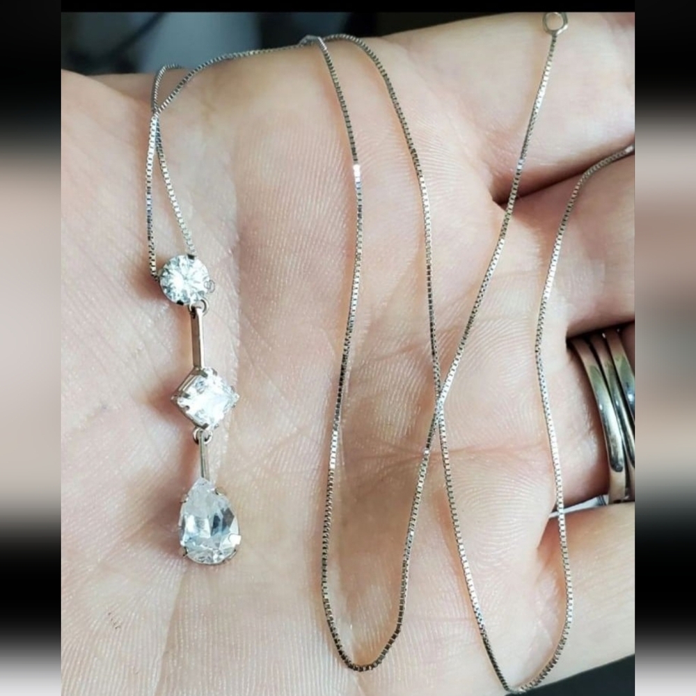 Solid 14k white gold necklace with CZ stones. Stamped 14k JCM and DQCZ. Big pend